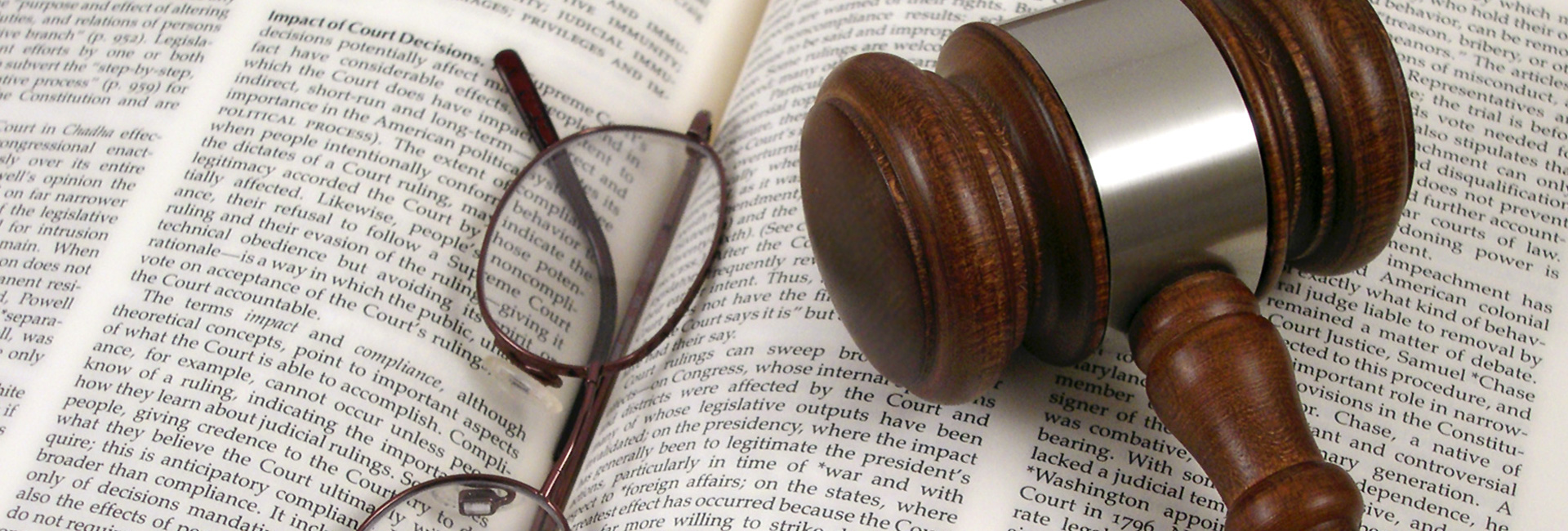 Gavel And Legal Book With Eyeglasses